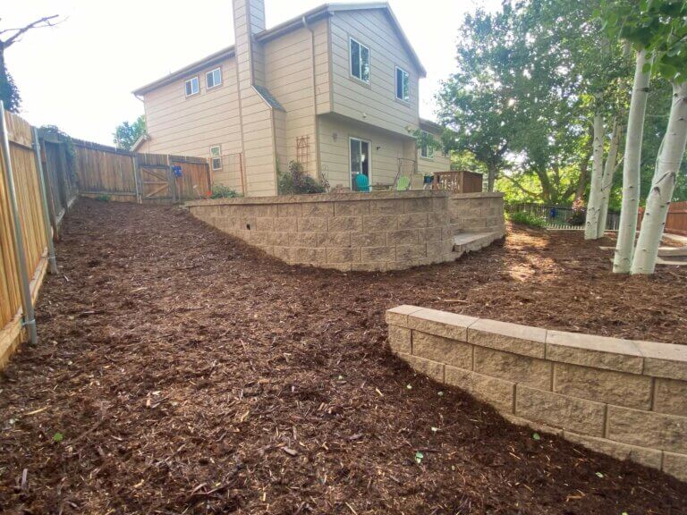 Backyard mulch and retaining wall