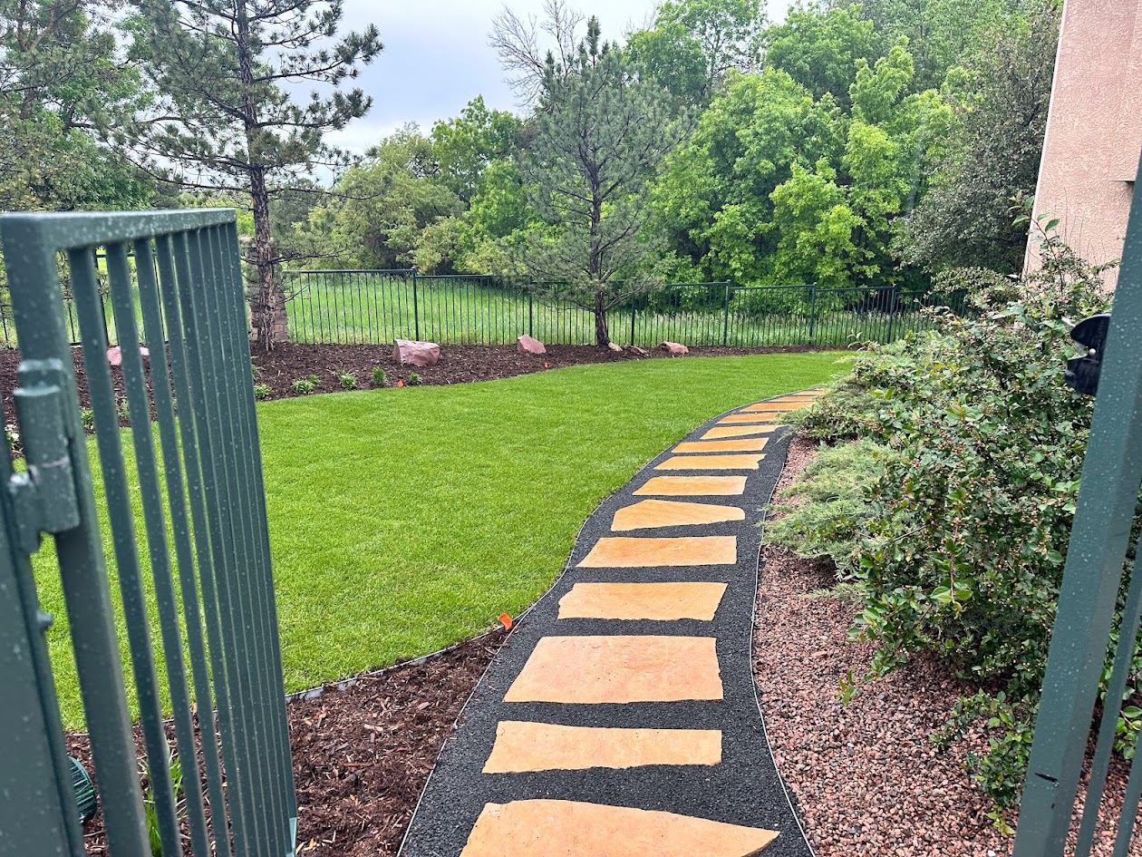 flagstone walkway sod greenery Colorado