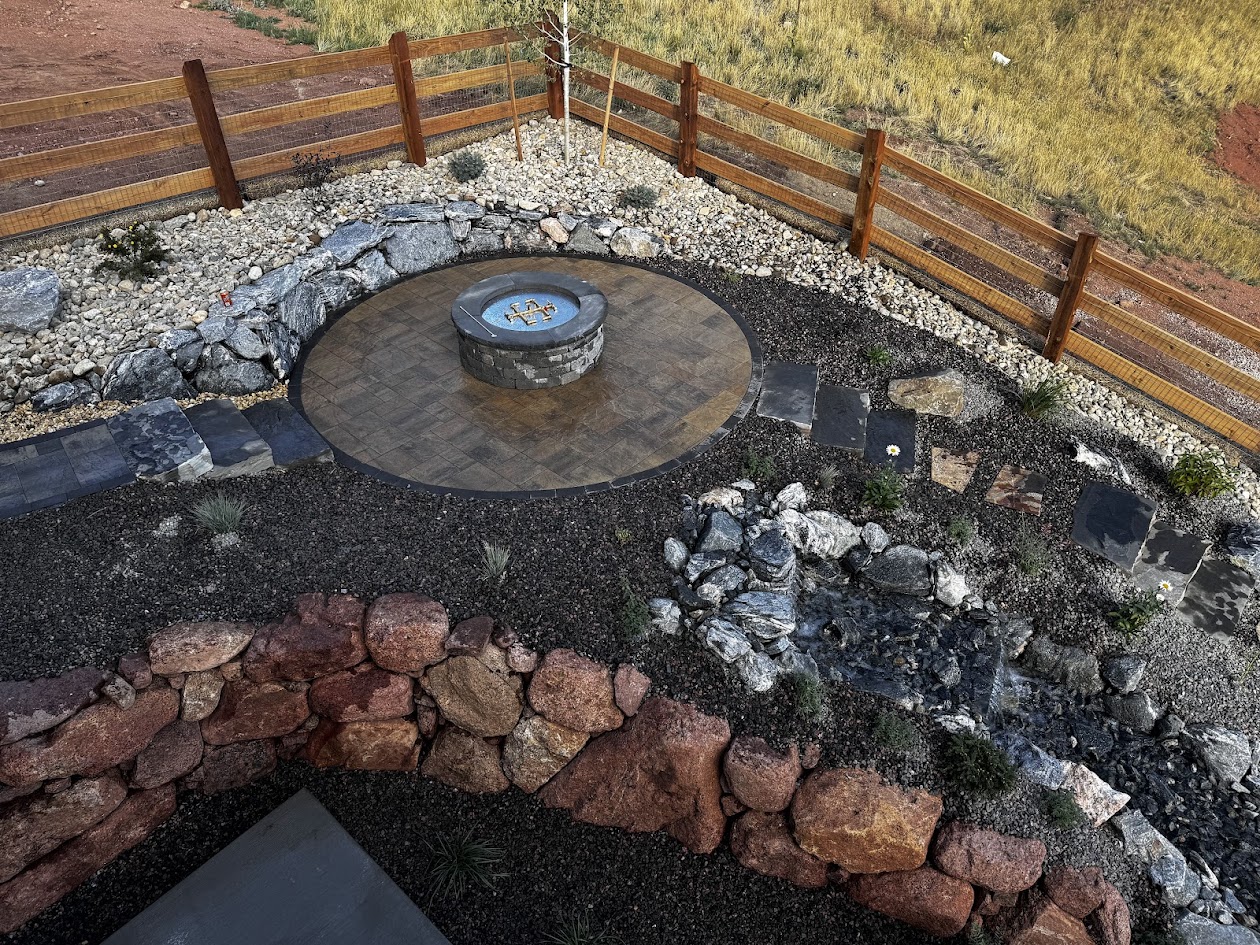 gas firepit rock wall xeriscaping water feature fencing Colorado